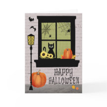 Halloween Window med svart katt och pumpor