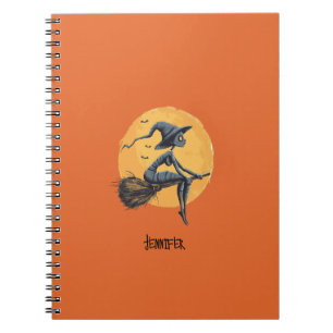 Halloween Witch Fliyng a Broomstick Orange Anteckningsbok