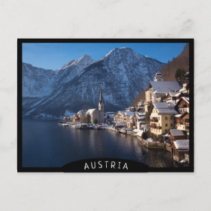 Hallstatt-staden i snö på vintern vykort