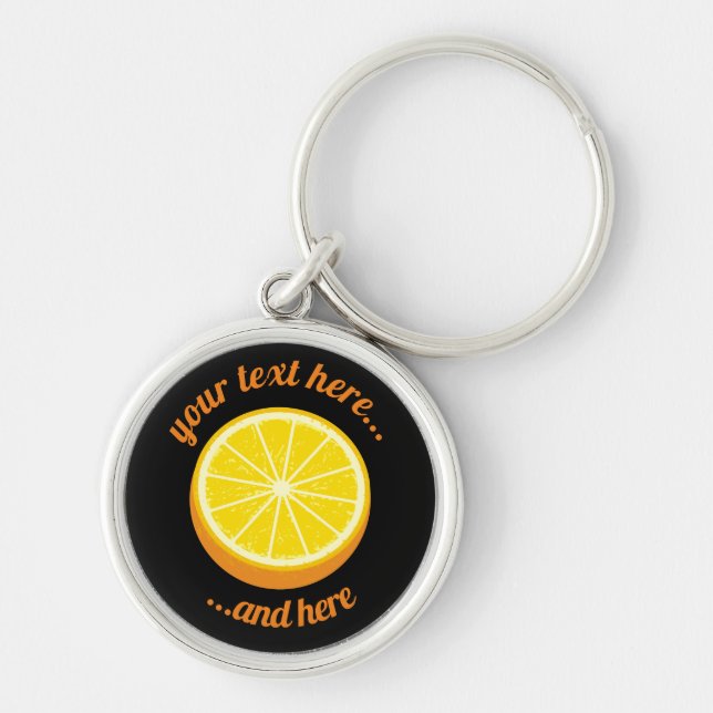 Halva Orange Rund Silverfärgad Nyckelring (Framsidan)