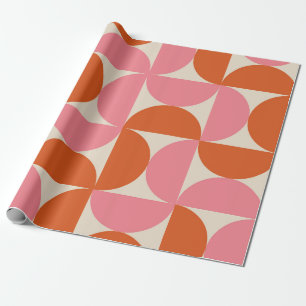 Halvcirkelmönster i rosa och orange från mitten av presentpapper