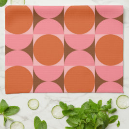 Halvhundraårskretsar på kvadraternas rosa och oran kökshandduk
