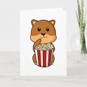 Hamster med kon av popcorn kort