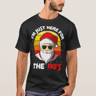 Han är bara här för Ho-tomtens lustigt julhopp T Shirt