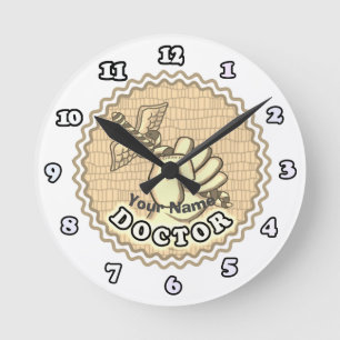 Hand holding caduceus doktor rund klocka