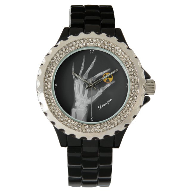 Hand med en strålningssymbol armbandsur (Framsida)