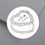 Hand plockade Vintage Cake Whimsical Bröllop Runt Klistermärke<br><div class="desc">Personlig Vintage Cake Bröllop Monogram Stickers. De här anpassningsbarna runt bröllopsmärken har en enkel illustration av tårtan mellan vintage och stil i mitten, kompletterad med parets monogram initialer och bröllop-datum för en tidlös och elegant beröring. Den minimalistiska designen användor en blandning av klassiskt serif och handskrivet skript typsnitt, vilket gör...</div>