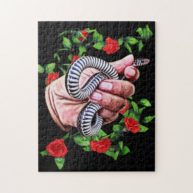 hand som håller baby orm, reptildjur pussel (Vertikal)