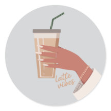 Hand som håller en kopp kaffe