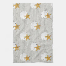 Handdukar och stjärnfiskar på drivträshanddukar