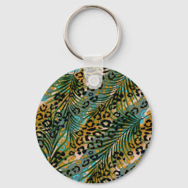 Handflatan lämnar på en leopard bakgrund. nyckelring