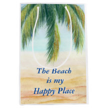 Handflatan träd en soldag på stranden