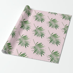 Handflatanlöv som slår in papper, grön rosa presentpapper