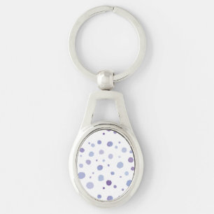handmålat polka dots ovalt silverfärgad nyckelring