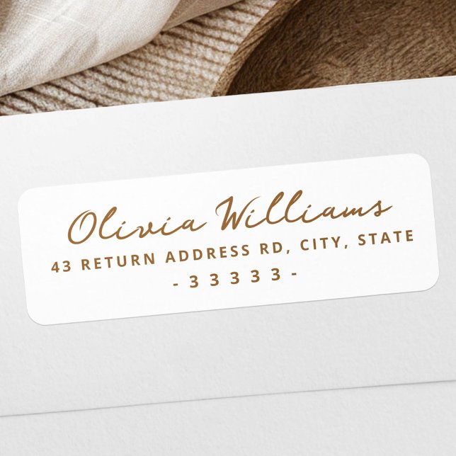 Handskriven etikett med vit returadress (Handwritten script white return address label)