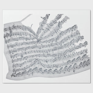 Handskriven melodi på sot i vintage presentpapper