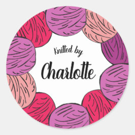 Handtrikå av bollar eller vara runt klistermärke