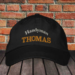 HANDYMAN (namn) broderade basebollsockel / guld Broderad Keps<br><div class="desc">Broderade hattar: Klassiskt golden/svart basebollsockel i mode med texten "HANDYMAN" och "namn" för den bästa handymannen i världen,  reparerar master,  åtgärdar alla/affärshattar</div>