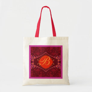 Hänger lös den exotiska snöremonogramen för k tygkasse