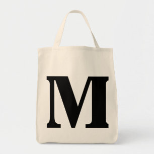 "HÄNGER LÖS DEN M-" MONOGRAMEN TYGKASSE