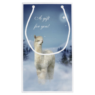 Hänger lös den små gåvan för Alpacavinterjul