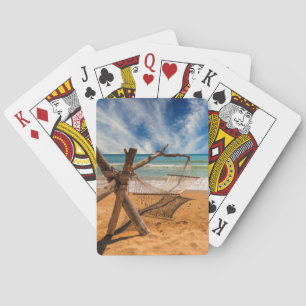 Hängmatta på en tropisk strandsemesterort casinokort
