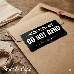 Hantera med försiktighet - Böj ej Svart fraktetike Fraktsedel