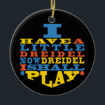 Hanukkah "Dreidel Play"/Circle Ornament<br><div class="desc">Hanukkah "Jag har en liten Dreidel... "/Circle Ornament. (2 sidor) Anpassa genom att ta bort text på utsmyckningens baksida. Skriv sedan in ditt eget ord i ditt favoritteckensnitt färg, storlekt och stil. Bakgrunden på ornamentens baksida och framsida kan ändras genom att du väljer färgrutorna i färg. Tack för att du...</div>