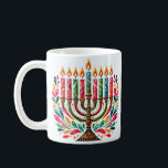 Hanukkah-festivalen i Ljus Kaffemugg<br><div class="desc">Gör firande till Hanukkah med vår exklusiv Festival of Ljus samling! Utforska vackert designade Hanukkah-kort, mysiga och festliga kläder och elegantens dekoration för att ge värme till varje natt av helgdag. Perfekt för presenter eller förbättring av ditt eget firande, vår samling fångar Hanukkahs anda med unika, högkvalitativa utformningar som inspirerar...</div>
