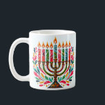 Hanukkah-festivalen i Ljus Kaffemugg<br><div class="desc">Gör firande till Hanukkah med vår exklusiv Festival of Ljus samling! Utforska vackert designade Hanukkah-kort, mysiga och festliga kläder och elegantens dekoration för att ge värme till varje natt av helgdag. Perfekt för presenter eller förbättring av ditt eget firande, vår samling fångar Hanukkahs anda med unika, högkvalitativa utformningar som inspirerar...</div>