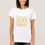 Hanukkah "LIGHT EAT SPIN REPEAT" Basic T-Shirt<br><div class="desc">Hanukkah "LIGHT EAT SPIN REPEAT" Guld Basic T-Shirt Välj mellan över 155 skjortor stilar och storlekar för den här utformningen. Tack för att du stannade och shoppade förbi! Mycket uppskattat! Lycklig Chanukah/Hanukkah!!! Stil: Women's Basic T-Shirt Den här grundläggande t-shirt-skjortan har en avslappnad passning för kvinnans form. Den här t-tröjan är...</div>