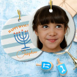 Hanukkah Menorah Photo Blue Orange Julgransprydnad Keramik<br><div class="desc">Byt ut din Hanukkah-önskemål med den moderna,  stripade Menorah-designen. Fortfarande med det traditionella säsong färg. Den blå Menorah har orange. Blues and oranges. Det finns en ställe för ditt eget personliga foto eller familjefoto Modern och enkelt Hanukkah hälsning.</div>