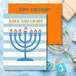 Hanukkah Modern Menorah Blue Greeting Card Vykort<br><div class="desc">Byt ut din Hanukkah-önskemål med den moderna, stripade Menorah-designen. Fortfarande med det traditionella säsong färg. Den blå Menorrah har orange. Blues and oranges. Det finns plats för ditt helgdag på baksidan med ord "Kärlek och ljus" som kan tas bort om du inte vill använda det. Modern och enkel Hanukkah hälsning....</div>