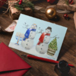 Hanukkah och jul Snögubbe Watercolor Helg Vykort<br><div class="desc">Den här designen kan vara personlig i det område som tillhandahålls genom att ändra fotot och/eller text. Du kan också anpassa den genom att klicka för att anpassa ytterligare alternativ och ta bort eller ändra färg i bakgrunden, lägga till text, ändra texten färg eller stil eller ta bort texten för...</div>