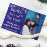 Hanukkah Peace Kärlek Light Photo Snowflake Blue Julkort<br><div class="desc">Den här designen kan vara personlig i det område som tillhandahålls genom att ändra fotot och/eller text. Du kan också anpassa den genom att klicka på Anpassa den här mallen och sedan välja klicka för att anpassa ytterligare alternativ och ta bort eller ändra färg i bakgrunden, lägga till text, ändra...</div>