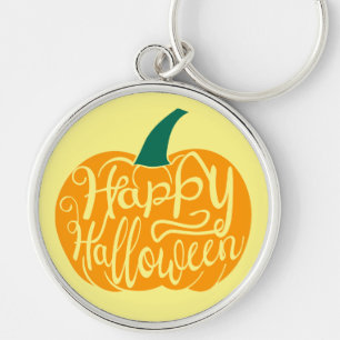 Happy halloween-bokstäver på karvpumpa rund silverfärgad nyckelring