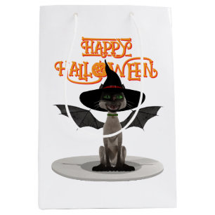 Happy halloween. Katt med vingar och häxhatt