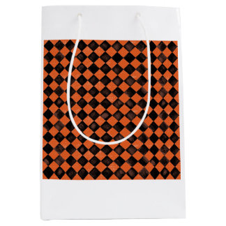 Harlequin i svart och orange