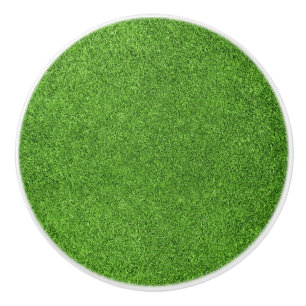 Härlig grön grässtruktur från golfbana knopp