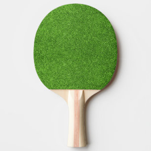 Härlig grön grässtruktur från golfbana pingisracket