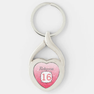 Härlig rosa sötsak 16 twisted heart silverfärgad nyckelring
