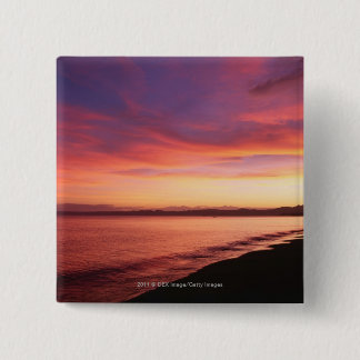 Härlig solnedgång på stranden knapp