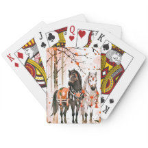 Hästar i en röd skog