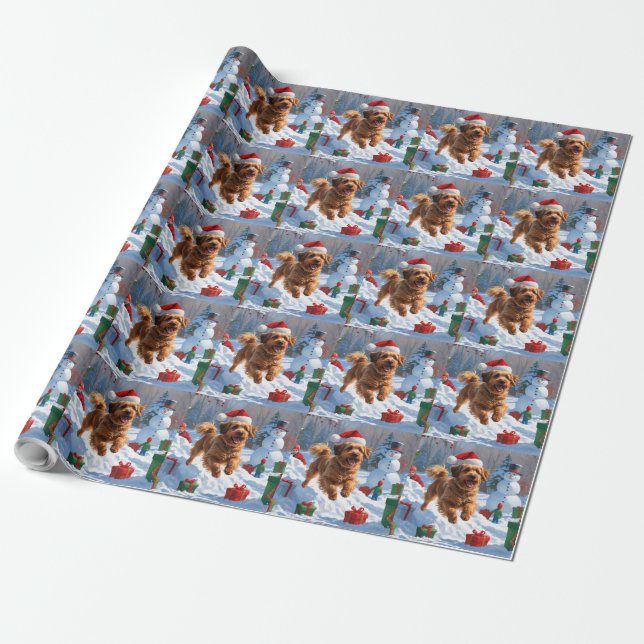 Havanesiska springer i snö med julhatt presentpapper (Utrullad)