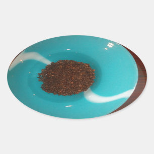 Havets beröring: En cyan Bowl av kaffe Ovalt Klistermärke