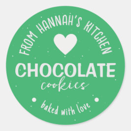 Havsgrön glitterbakgrund bakad med kärlek runt klistermärke