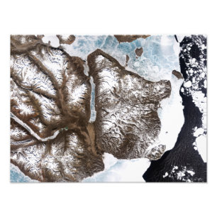 Havsisen linjer vid kustlinjen i östra Greenlan Fototryck