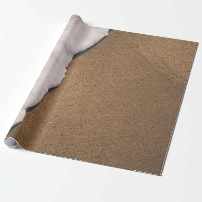 Havsskum på sand presentpapper (Utrullad)