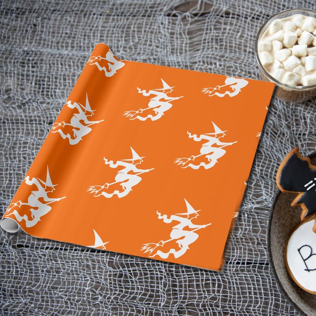 häxsilhuett i nybörjare orange presentpapper (Skapare uppladdad)