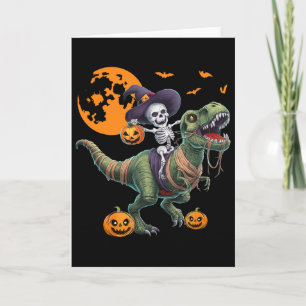 Häxskelett ridande på dinosaurie T Rex Halloween k Kort